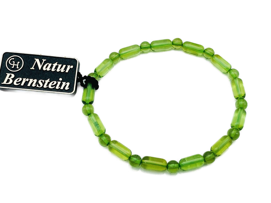 Armband mit länglichen und runden Kugeln aus grünem Bernstein | Silber