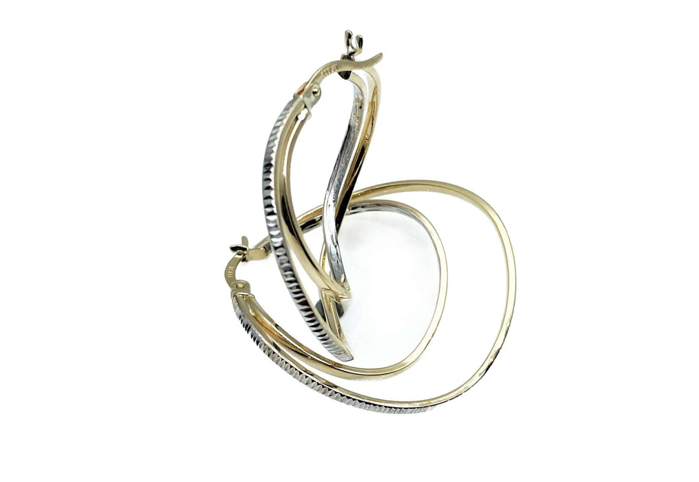 Große Creolen in Gold mit Schliff